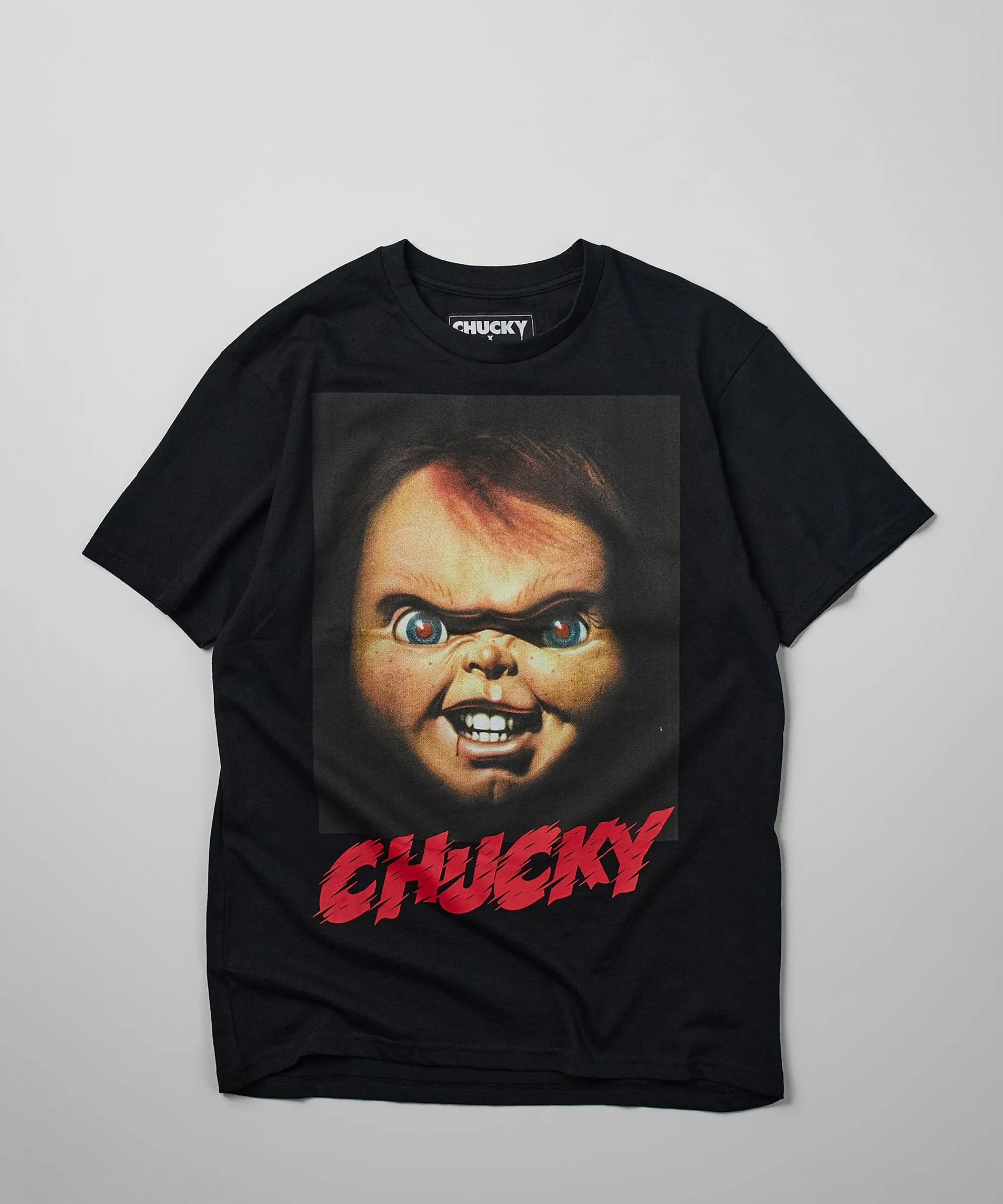 chucky_face_short_sleeve_tee__black_0.webp Shop Chucky Face Short Sleeve Tee - Black Graphic Tees