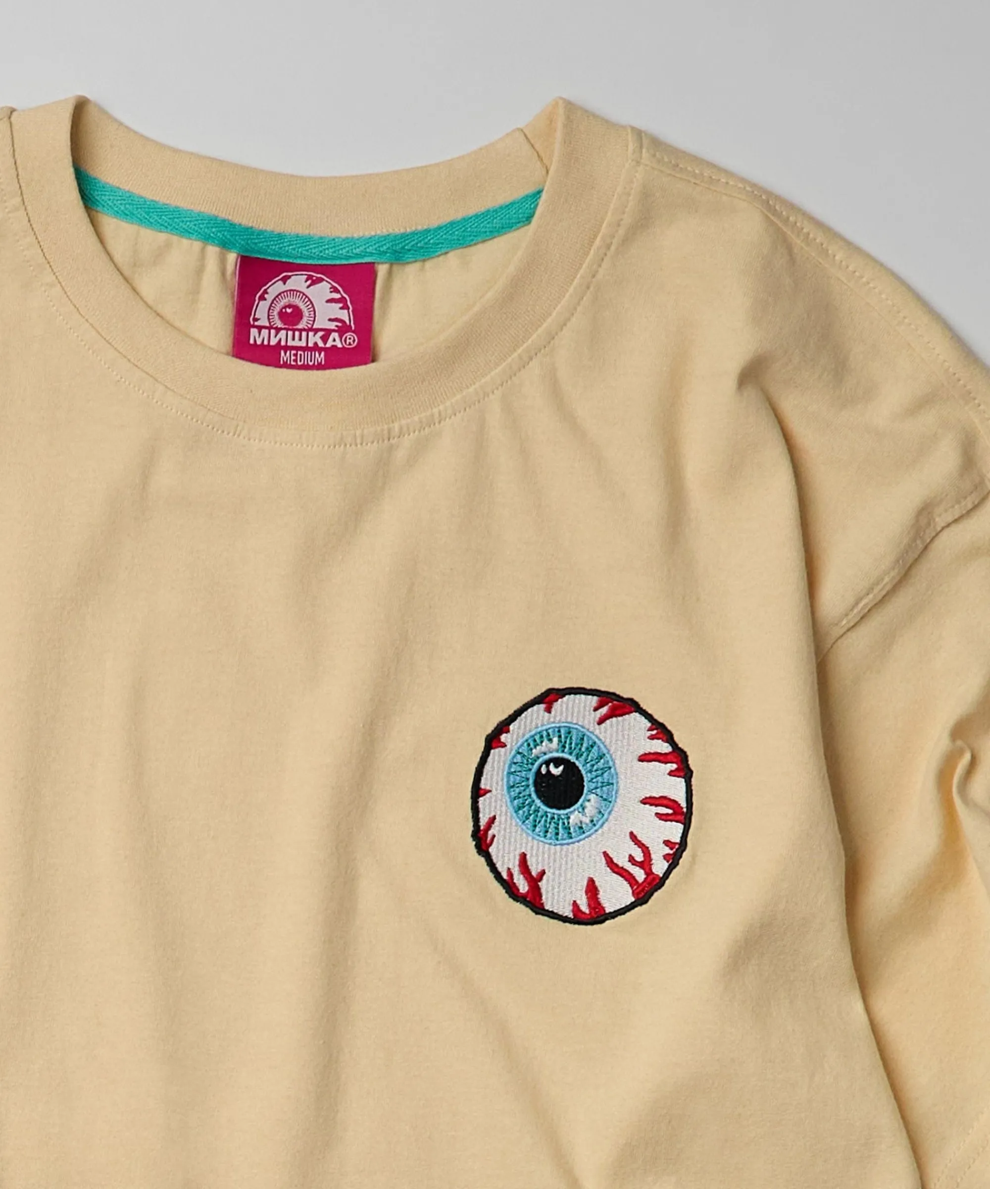 mishka_embroidered_keep_watch_short_sleeve_tee__khaki_1.webp Discount Mishka Embroidered Keep Watch Short Sleeve Tee - Khaki Graphic Tees
