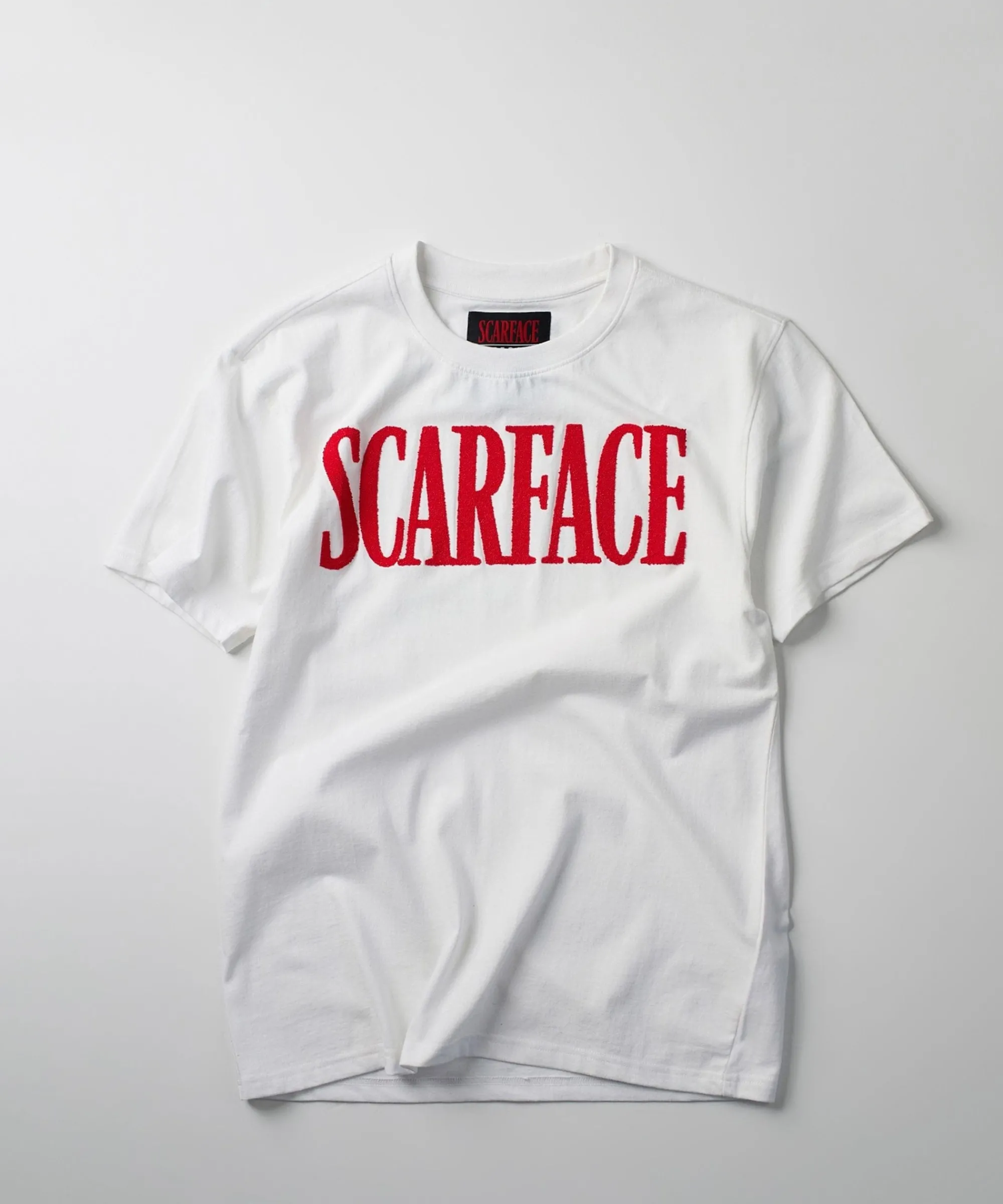 plus_size_scarface_logo_caviar_print_short_sleeve_tee__white_0.webp Store Plus Size Scarface Logo Caviar Print Short Sleeve Tee - White Graphic Tees